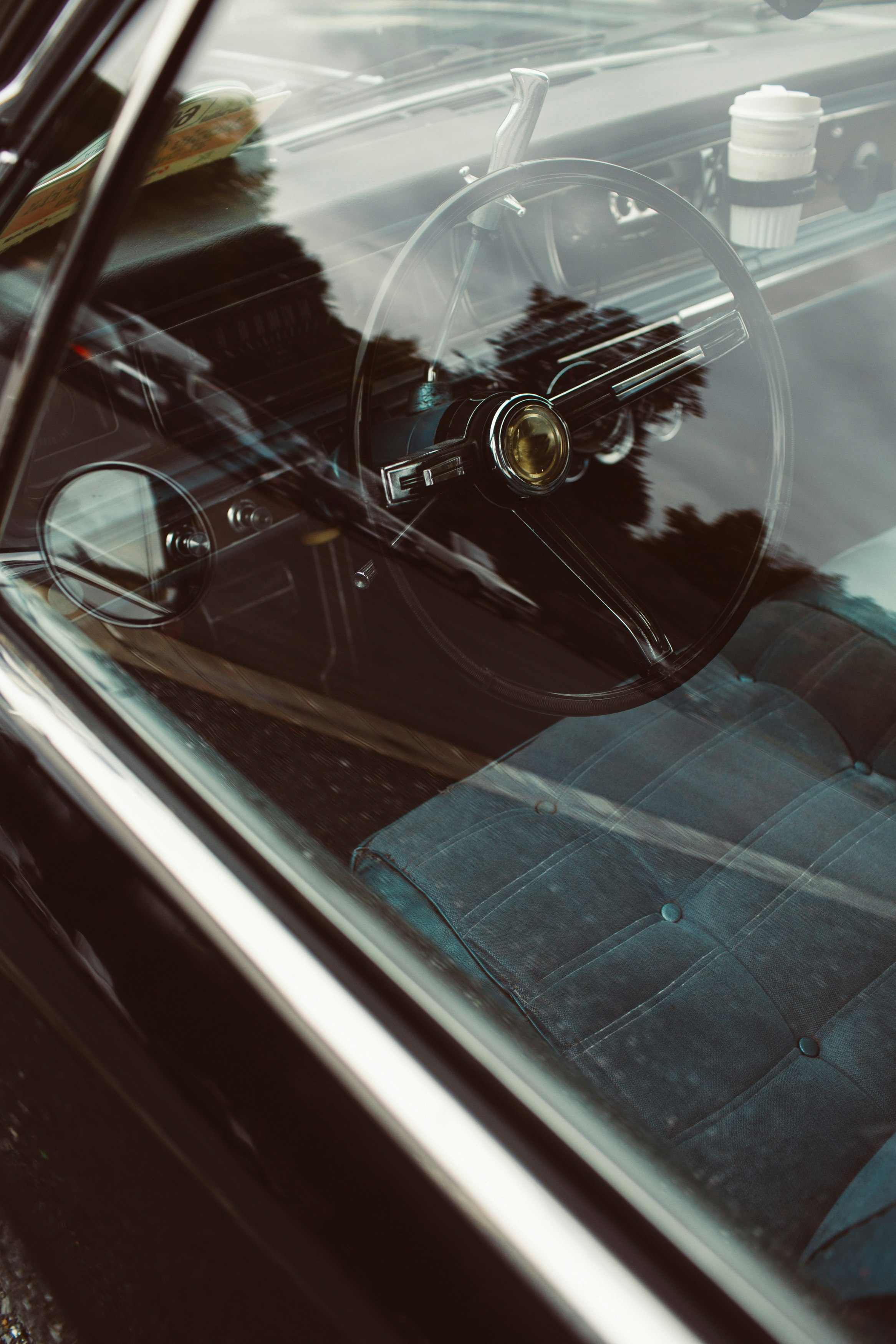 red car with white steering wheel